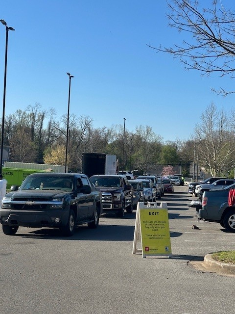 Vehicles waiting in line for Hazardous Waste Collection event 