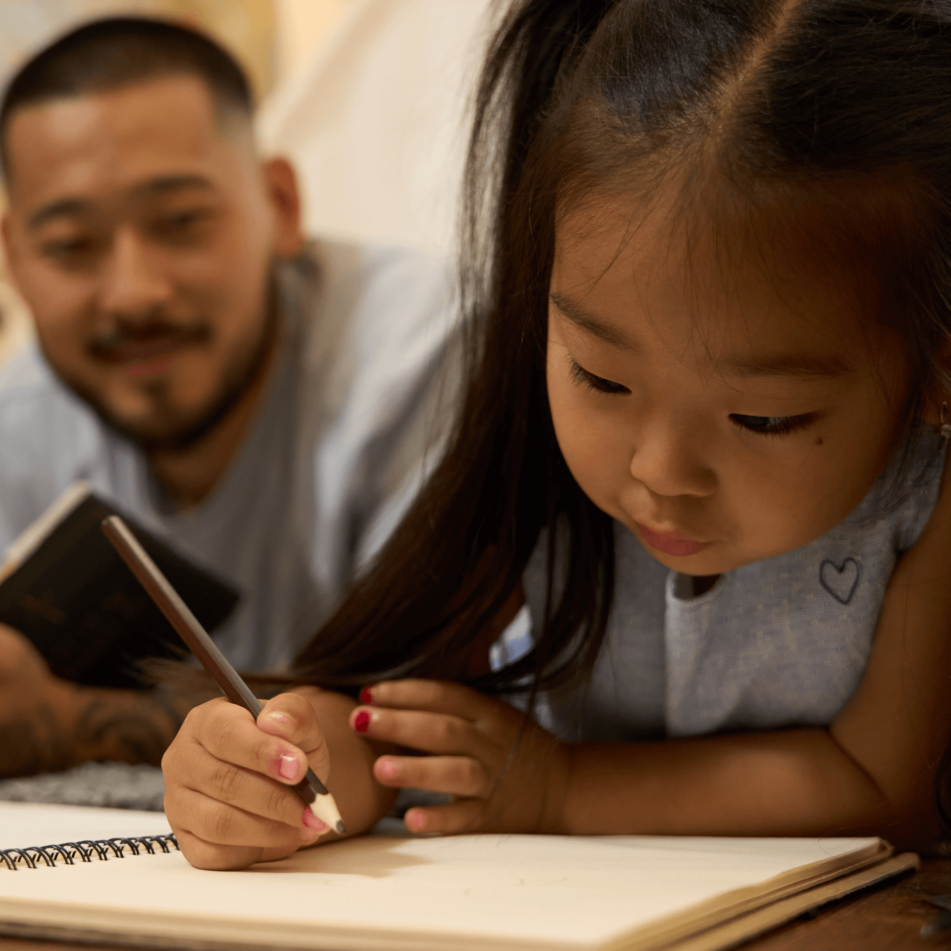 Elementary student receiving one-on-one tutoring help